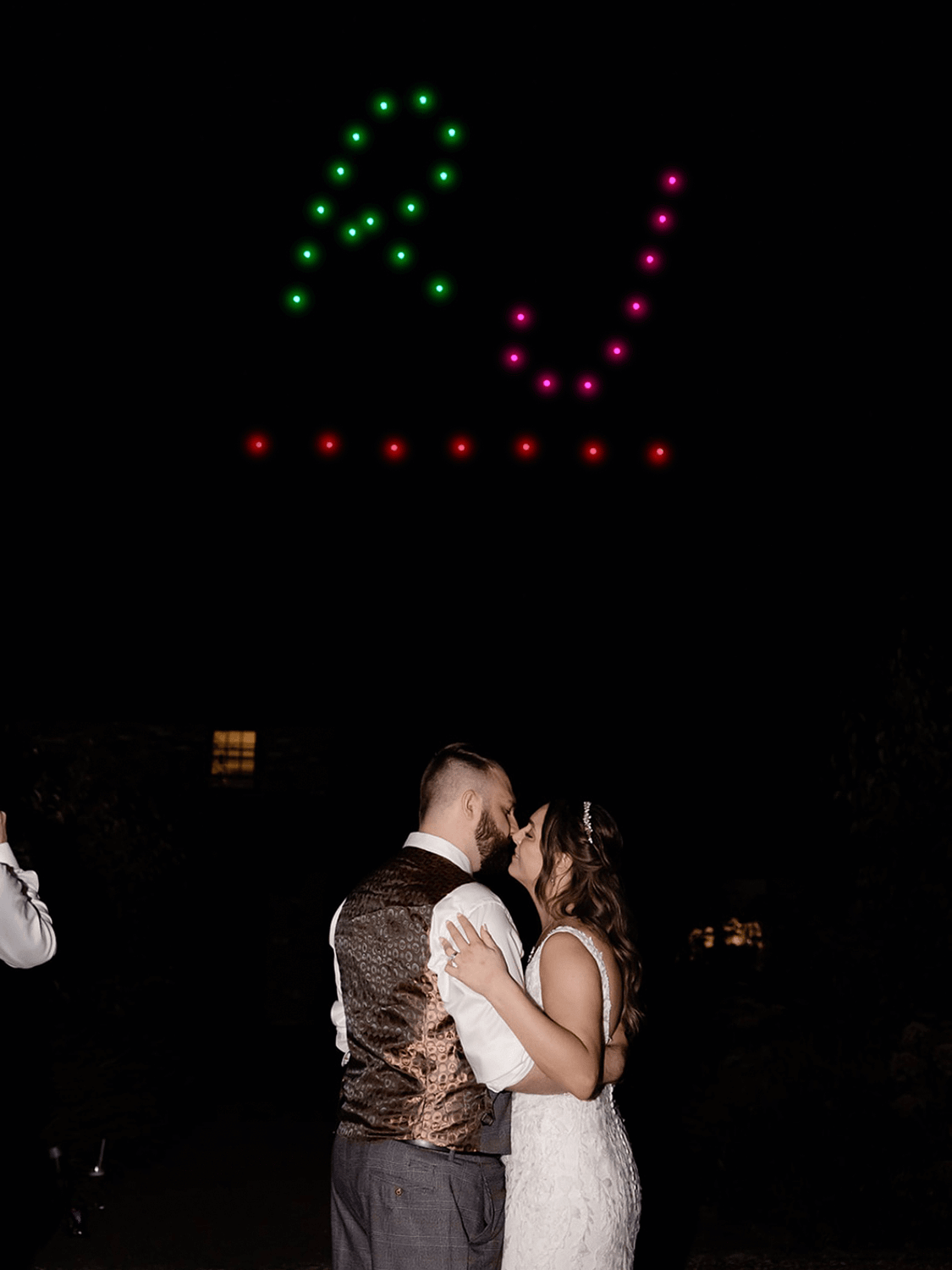 RJ initials in the sky with 30 drones in the wedding drone light show
